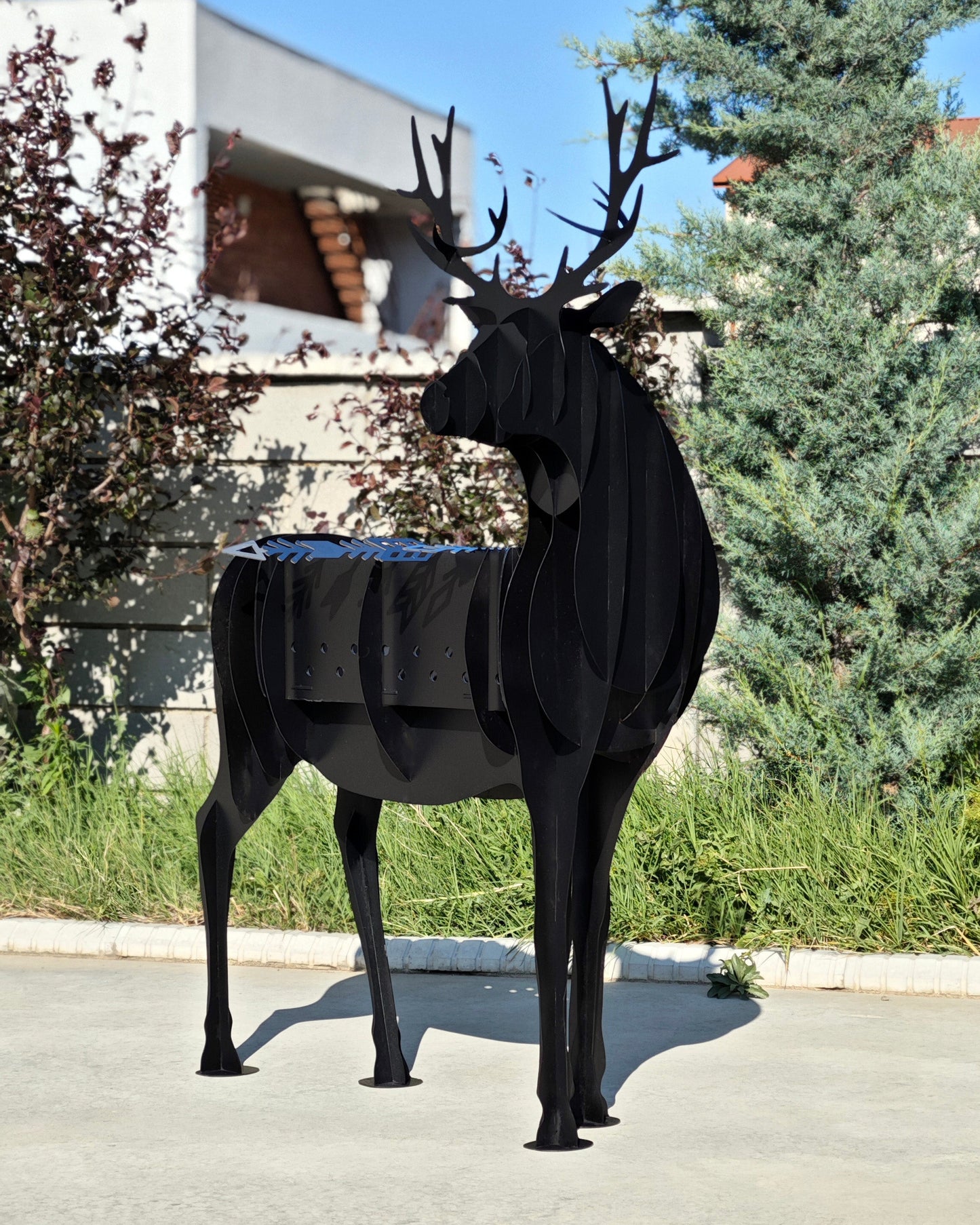 Large black metal deer grill